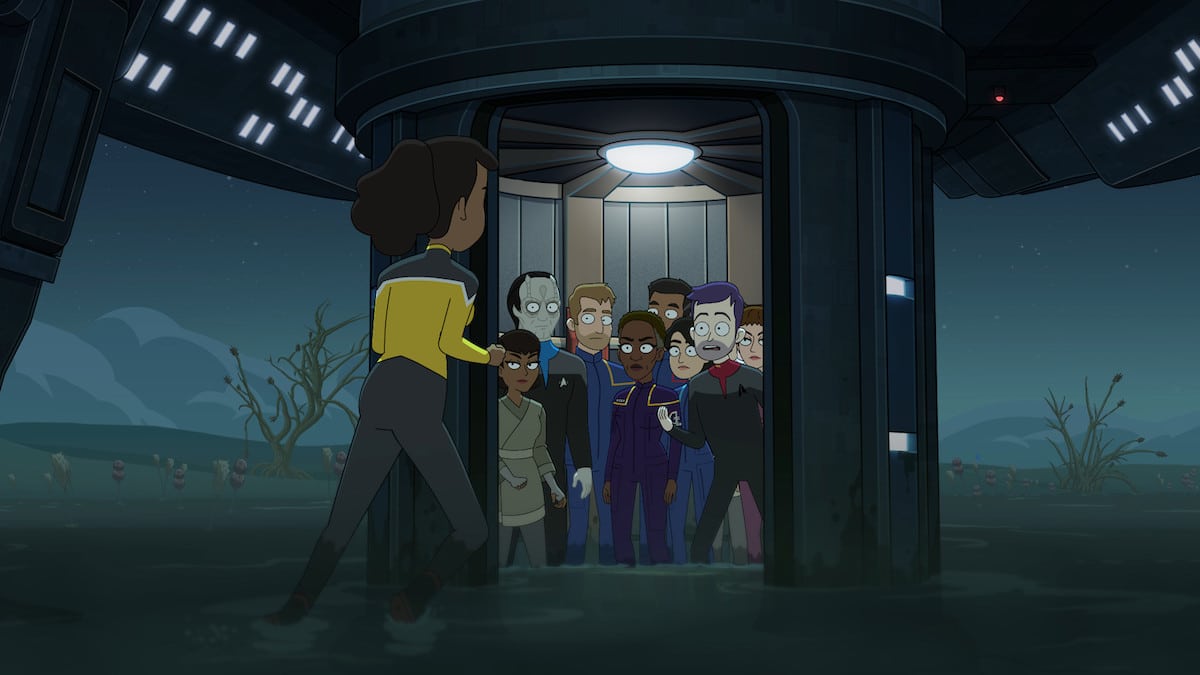 Star Trek: Lower Decks' "Fissure Quest." Mariner runs towards a lift filled with Lily, William, Garak, T'Pol and others.