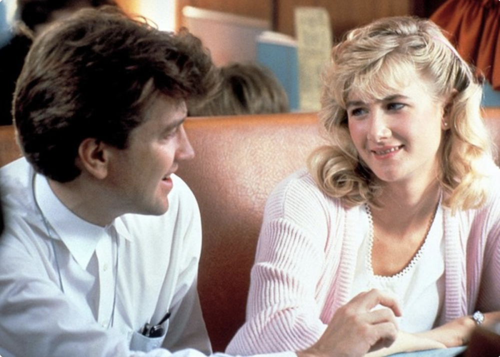 Lynch and Laura Dern sitting in a diner